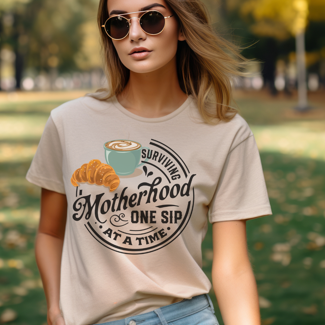 Surviving Motherhood One Sip at a Time Unisex Jersey Short Sleeve Tee