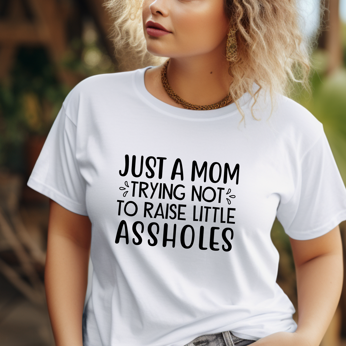 Just a mom trying not to raise little assholes Unisex Jersey Short Sleeve Tee